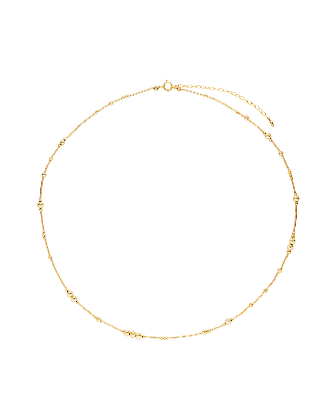 Gold necklace with fine gold tubes and smooth round gold beads in varying sizes