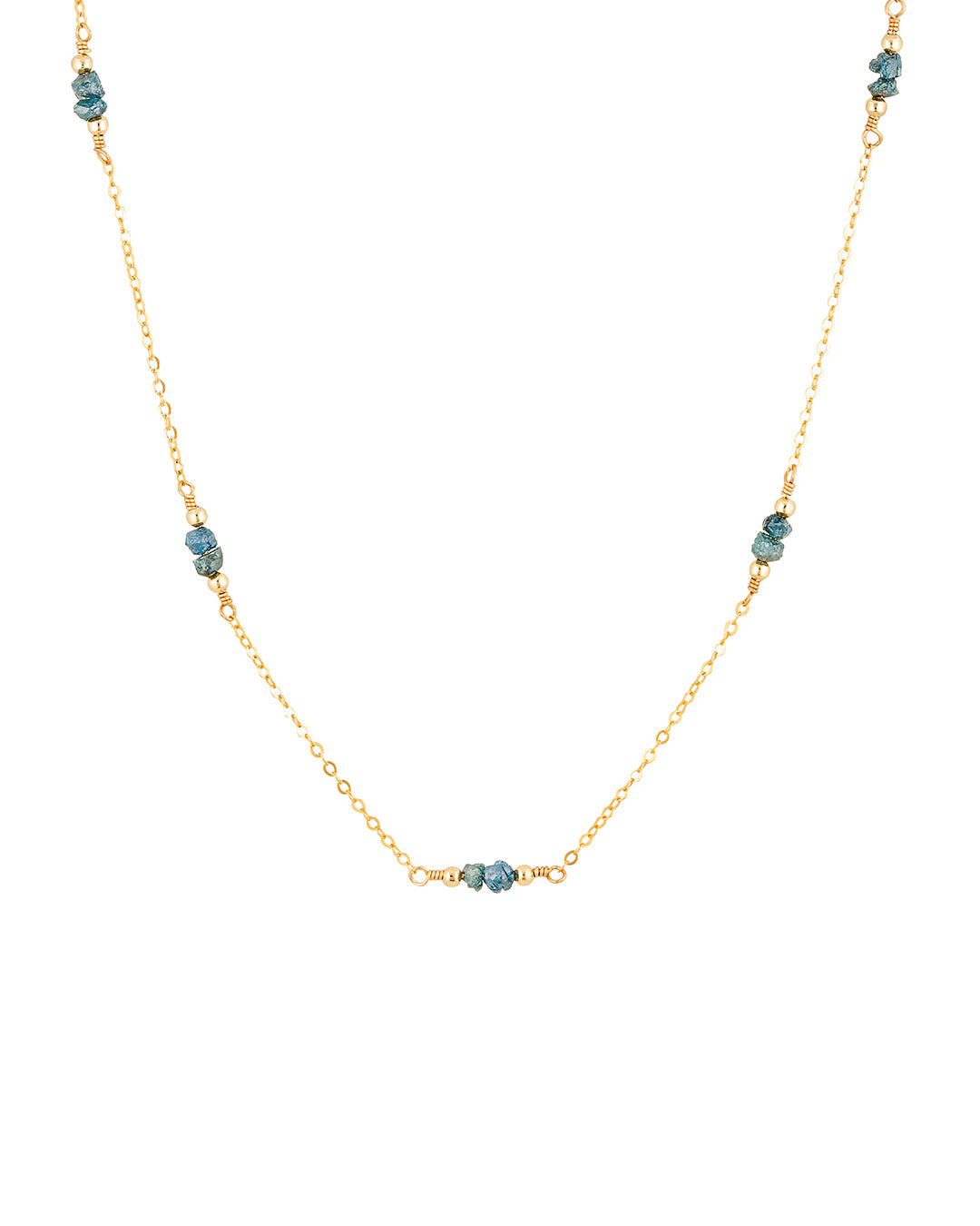 Gold necklace wth blue raw diamond gemstones, paired with gold beads