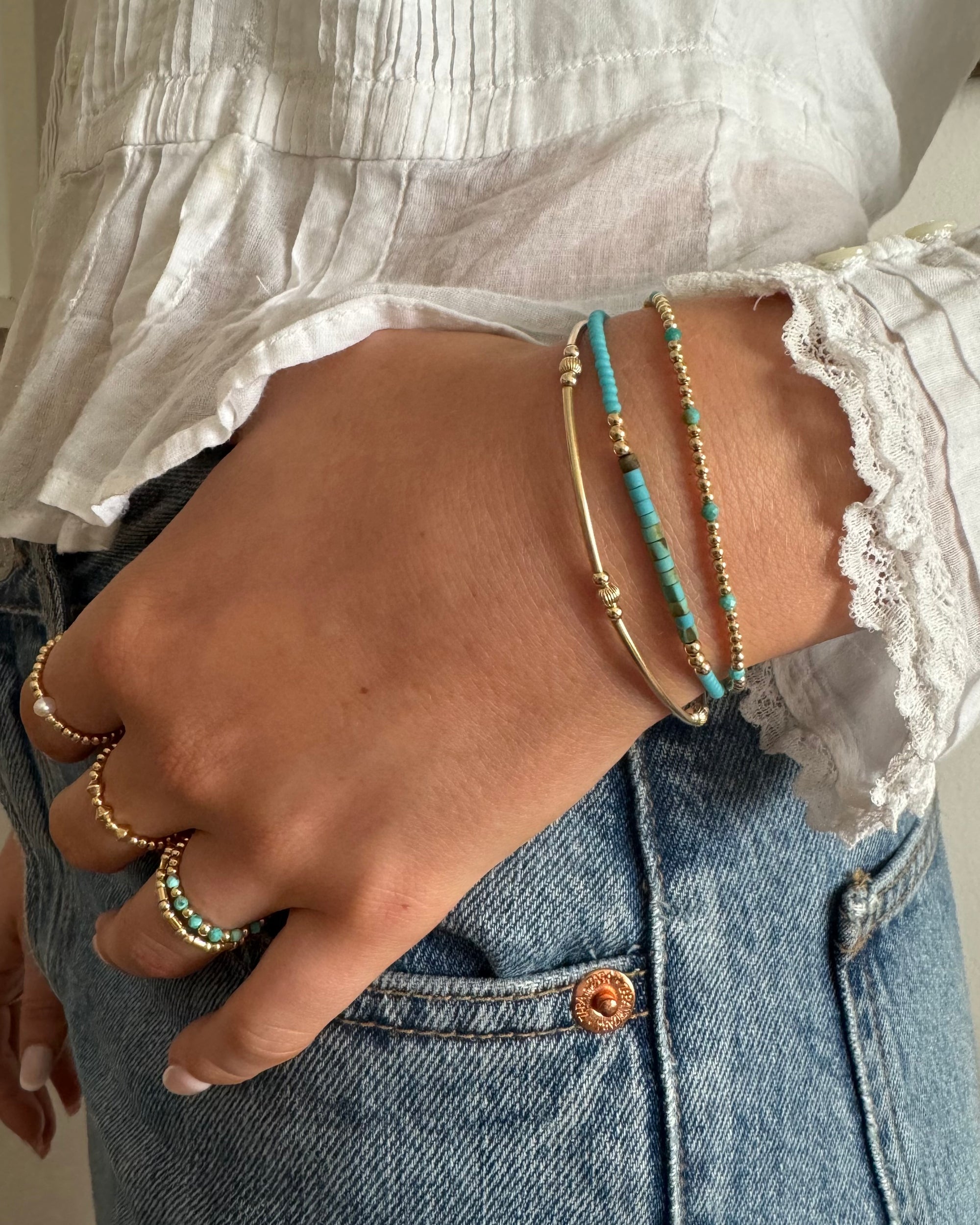 gold bead bracelet on stretch cord