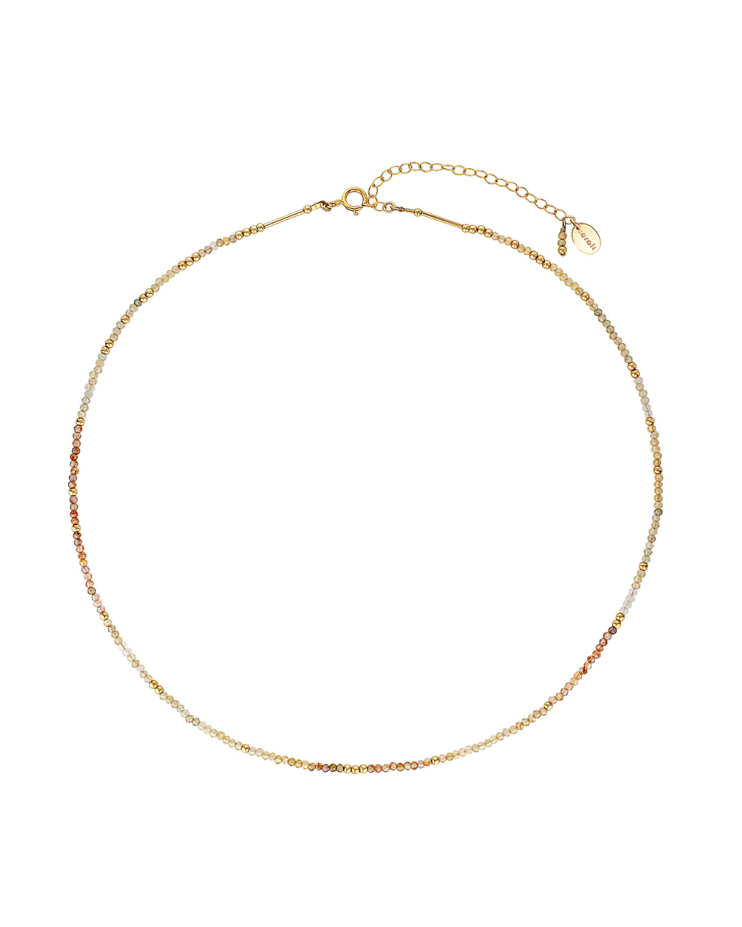 Gold and zircon gemstone necklace on a white background