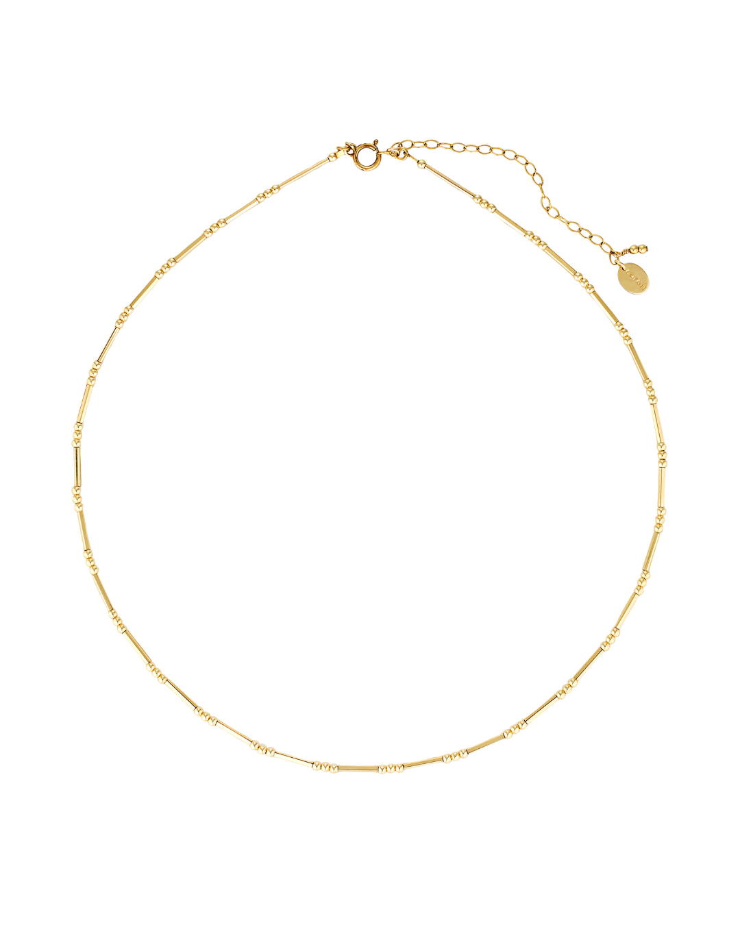 Gold beaded necklace on a white background