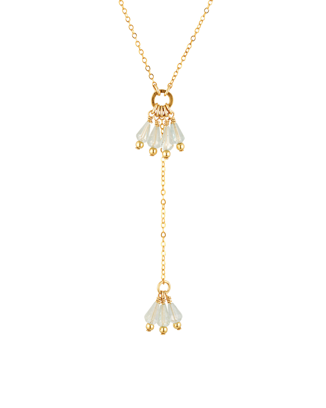 Gold lariat necklace with aquamarine gemstone tassels on a white background