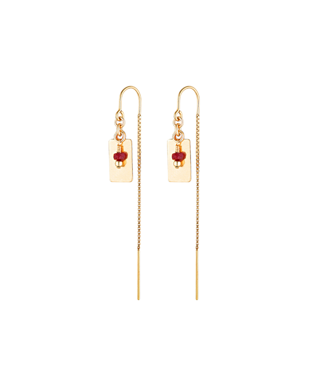 Gold thread ruby earrings on a white background