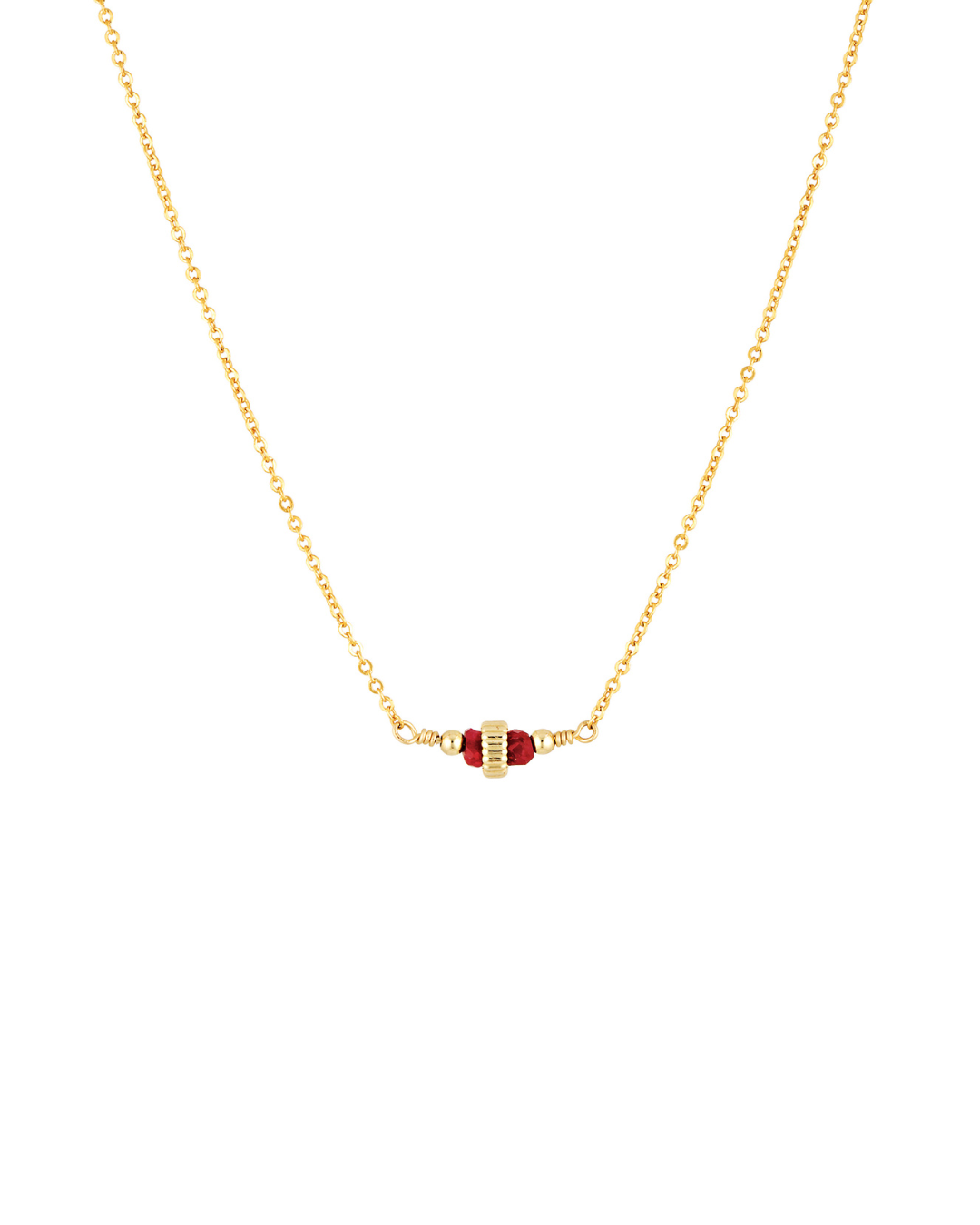 Gold and ruby gemstone necklace on a white background