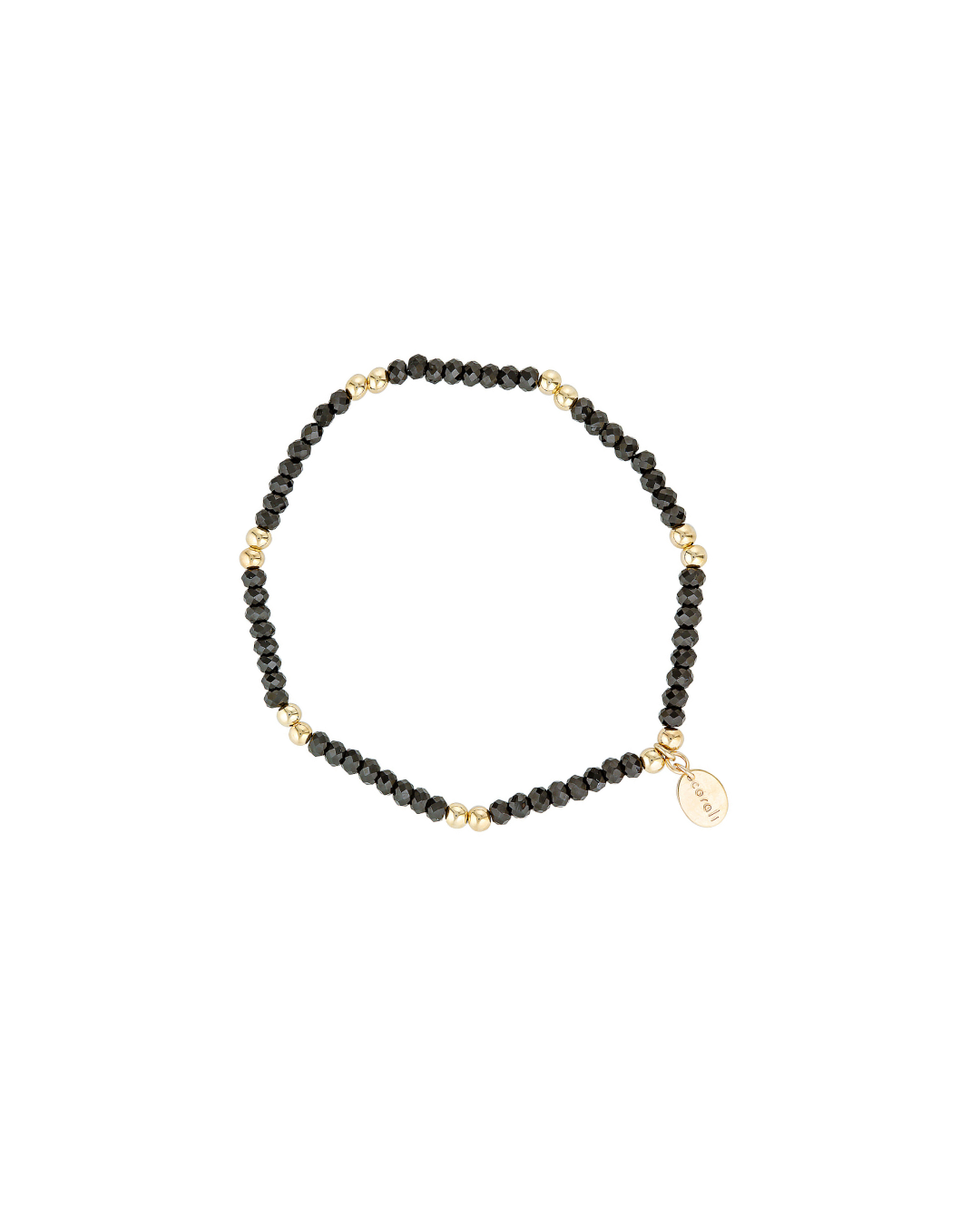Gold beaded bracelet with black spinel gemstones on a white background